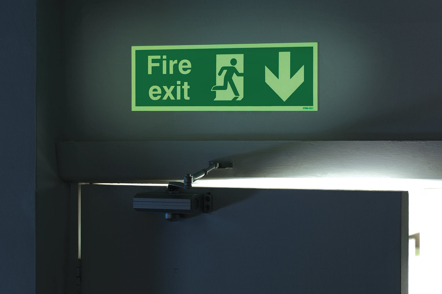 Safety Sign Niteglo Fire Exit Running Man Arrow Down Self-Adhesive 150x450mm NG28A/S