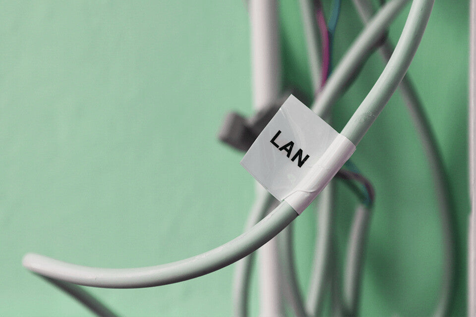 Brother TZE-FX261 label-making tape Black on white